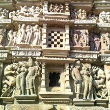 a building with sculptures on the side of it