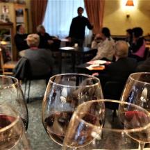 a group of wine glasses sitting on top of a table