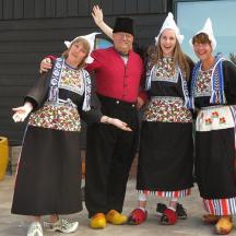 a group of people dressed up as chefs posing for a picture