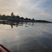 a view of a river with a boat in the water
