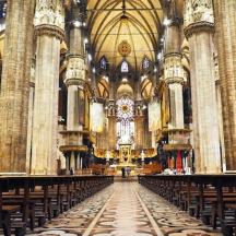 a large cathedral with a long aisle in it