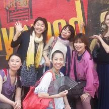 a group of women are posing for a picture