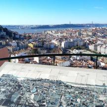 a view of a city from the top of a building