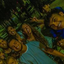 a group of people are posing for a picture