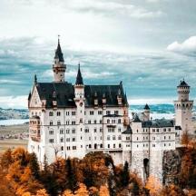 a large castle on top of a mountain