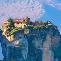 a house perched on top of a mountain