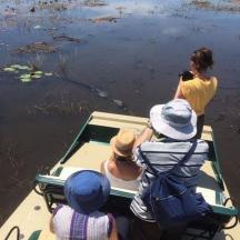 a group of people on a boat in the water