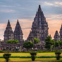 a view of the temples of angkor wat at sunset