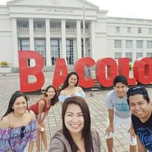 a group of people standing in front of a building