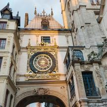 a large clock on the side of a building