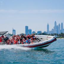 a group of people on a boat in the water