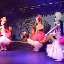 a group of women dancing on a stage