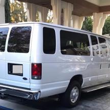 a white van parked in a parking lot