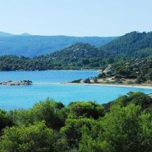 a large body of water with a boat in it