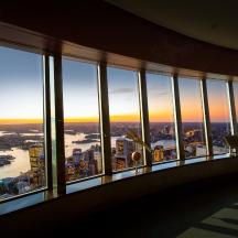 a view of a city from a building with windows