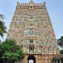 a large building with a large tower in front of it