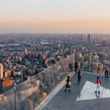 a view of a city from the top of a skyscraper