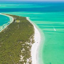 an aerial view of an island in the ocean