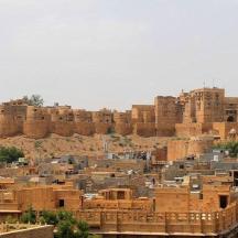 a large city with buildings on a hill