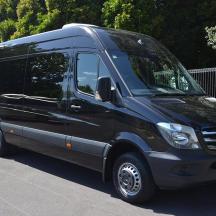 a black van parked in a parking lot