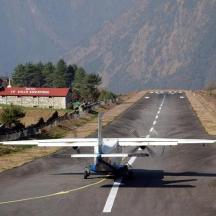 a small plane is sitting on a runway