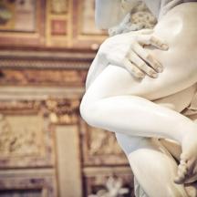 a statue of a woman in a room