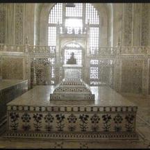 a large room with stairs and a large window