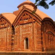 a large brick building with a dome