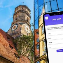 un telefono cellulare davanti a una torre dell'orologio