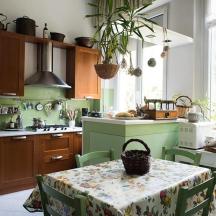 a kitchen with a table with a basket on it