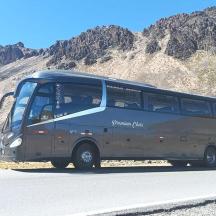 a bus is parked on the side of the road