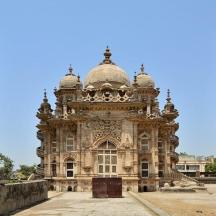 an old building with two domes on top of it