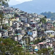 a bunch of buildings on top of a mountain