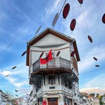 a building with a balcony on top of it