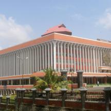 a large white building with a red roof
