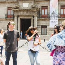 a group of people standing in front of a building
