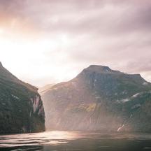 a view of a river between two mountains