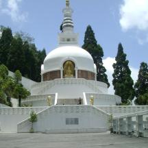 a large white building with a steeple on top
