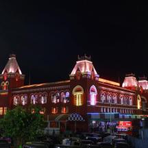 a large building with lights on it at night