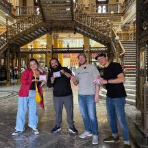 a group of people standing in a building