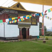 a building with colorful flags in front of it