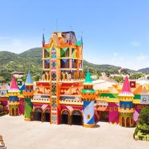 a large building in the middle of a park