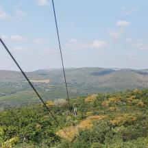 a view of the mountains from a zip line