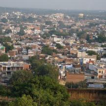 a view of a city with houses and buildings