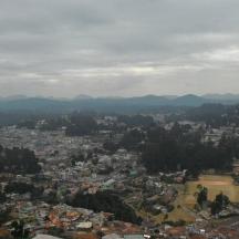 an aerial view of a city with a river