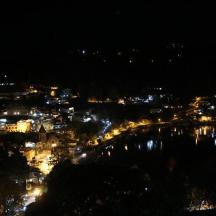 a view of a city at night with lights