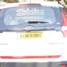 a car with a sticker on the back of it