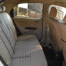 an empty seat in the back of a car