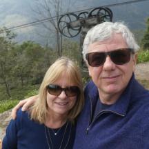 a man and a woman are posing for a picture