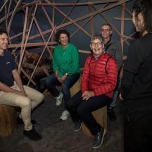 a group of people sitting in a room